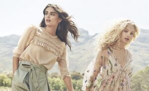 Taylor Hill en Frederikke Sofie dartelend door de weide in dromerige shoot voor H&M